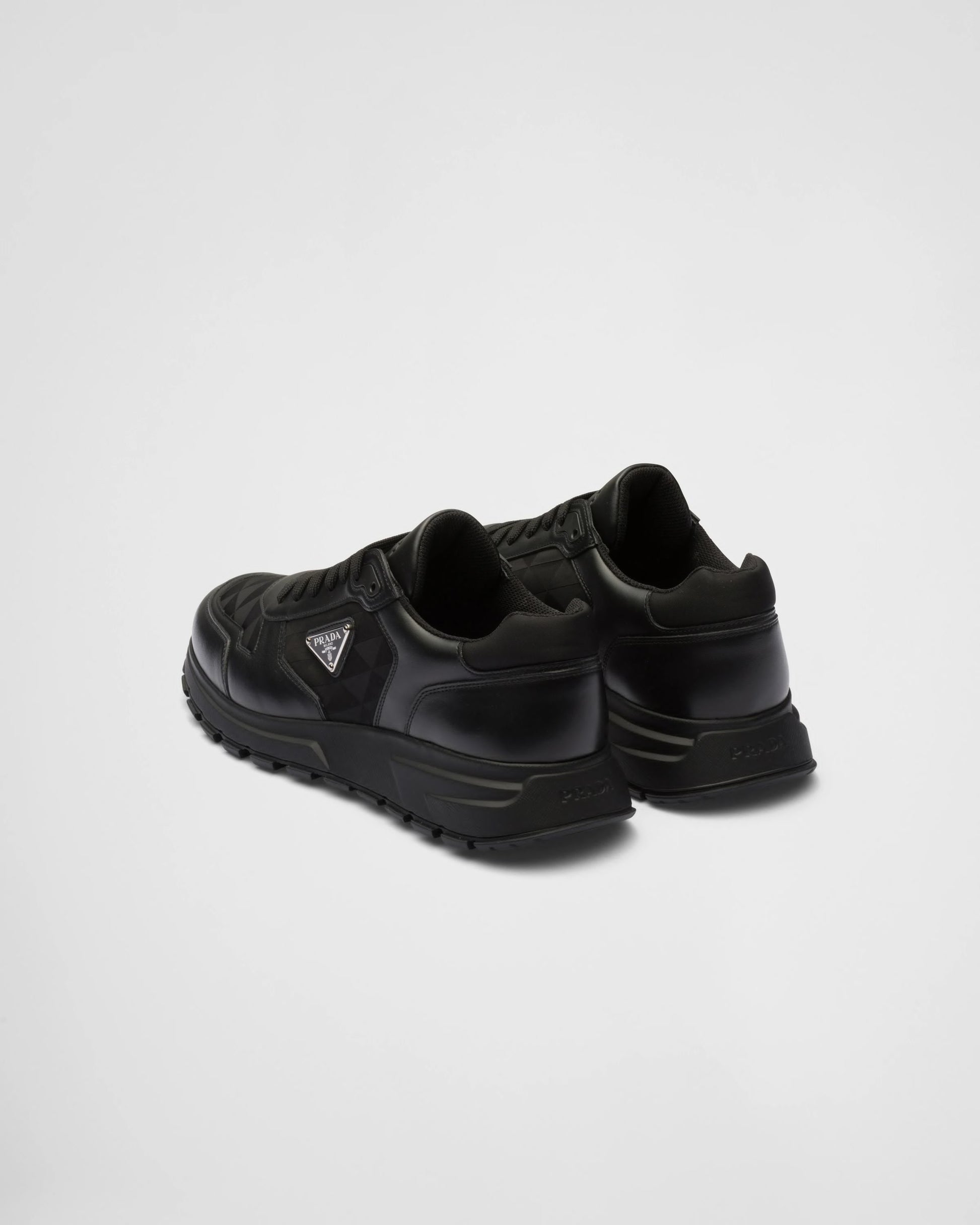 Leather and Re-Nylon high-top sneakers