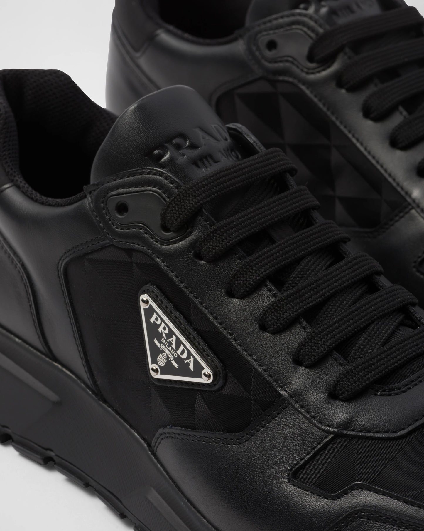 Leather and Re-Nylon high-top sneakers