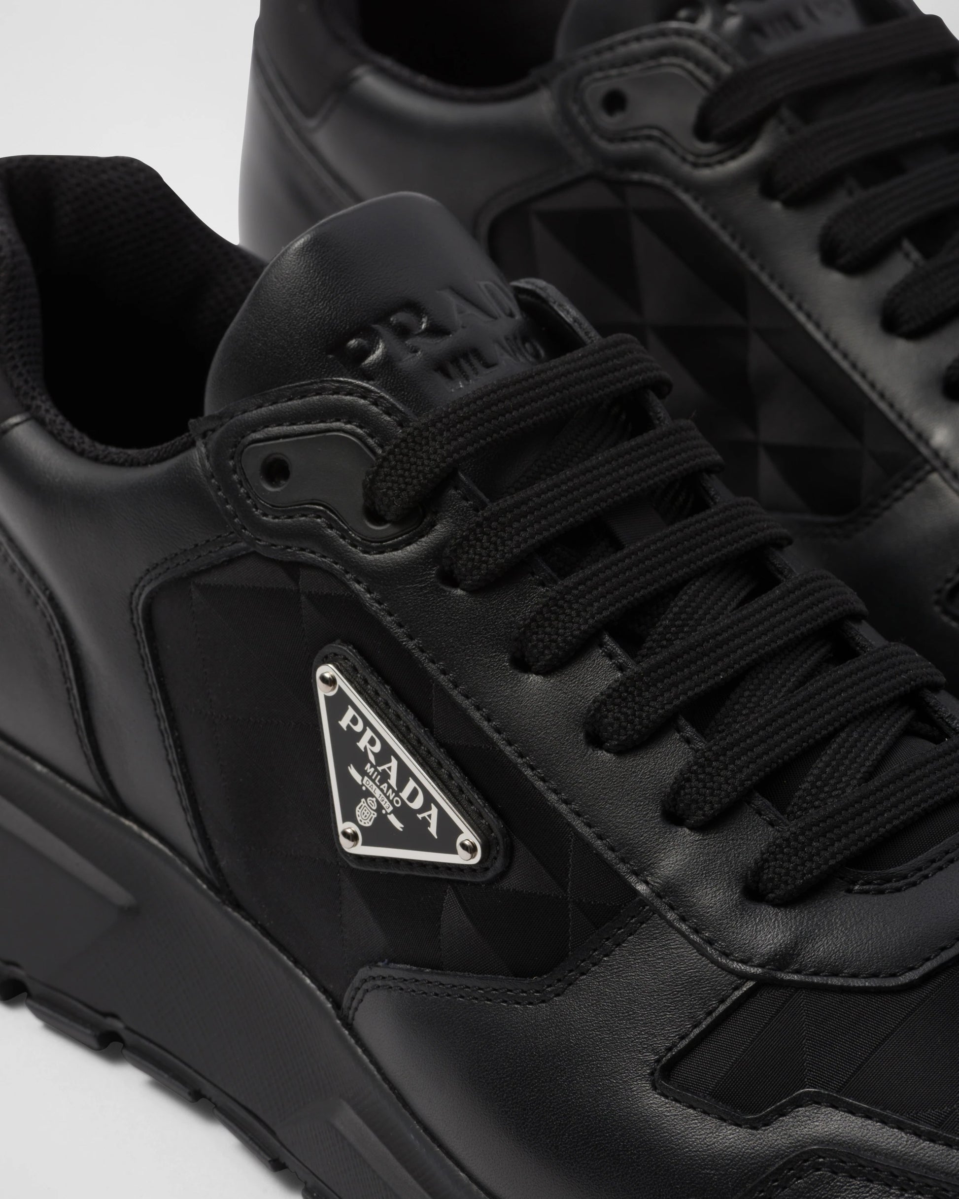 Leather and Re-Nylon high-top sneakers