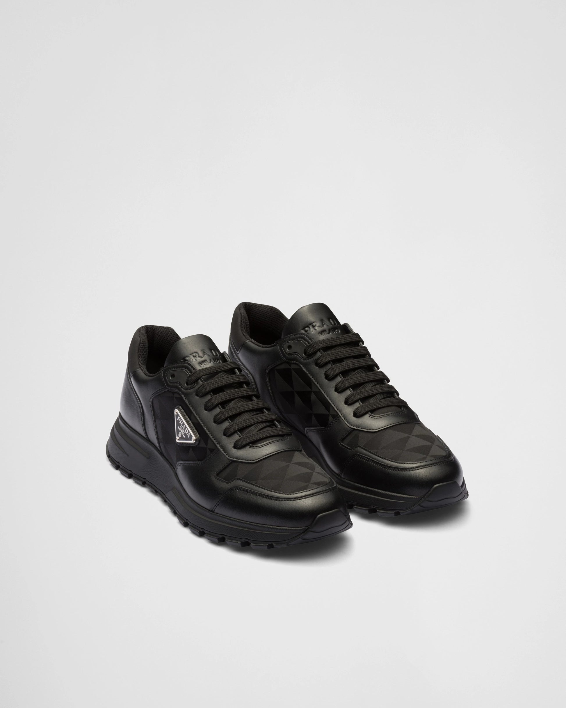 Leather and Re-Nylon high-top sneakers