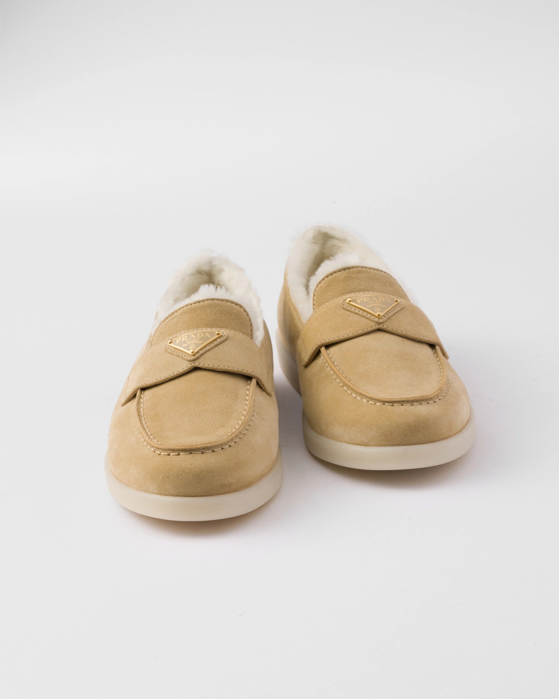 Suede and shearling loafers