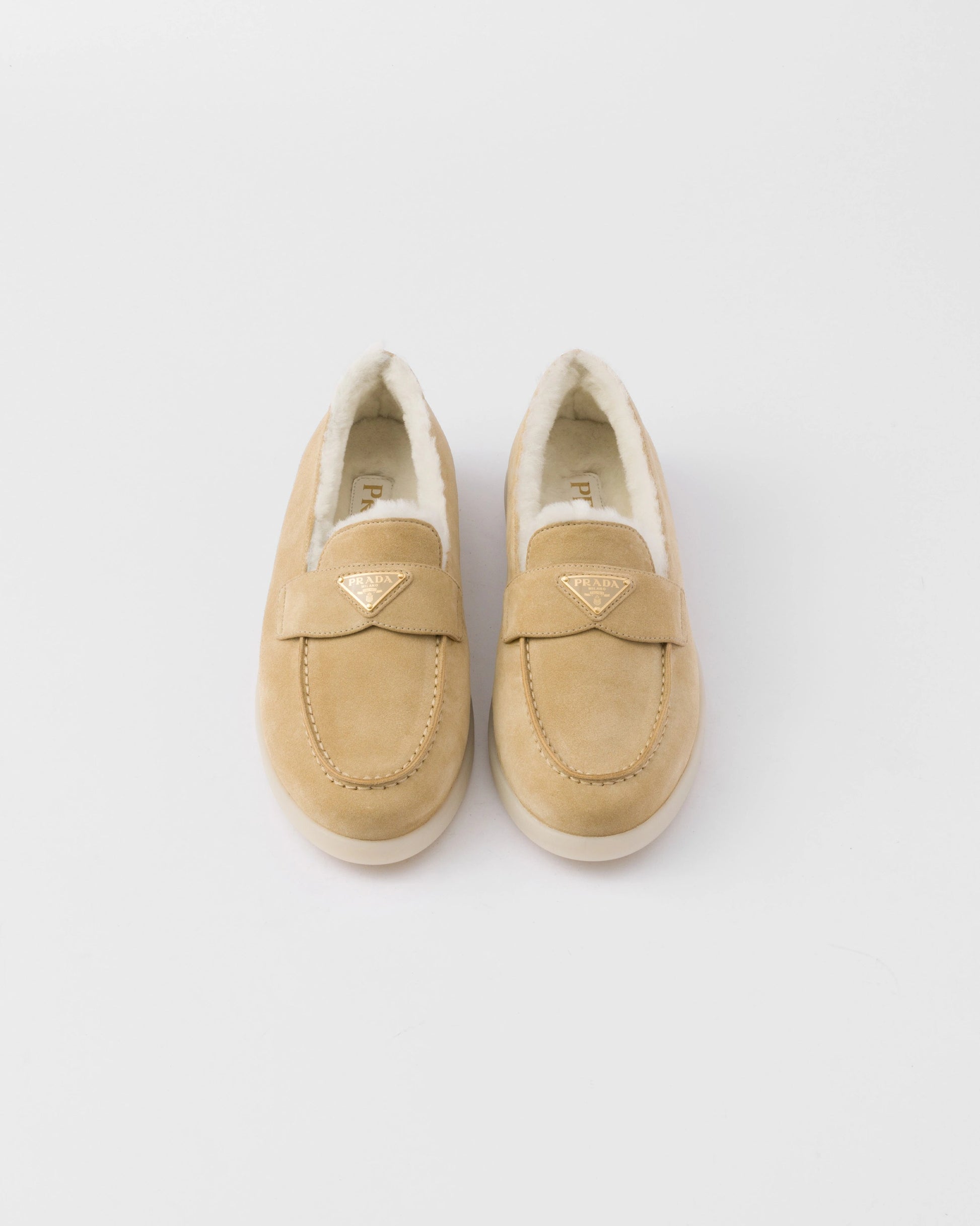 Suede and shearling loafers