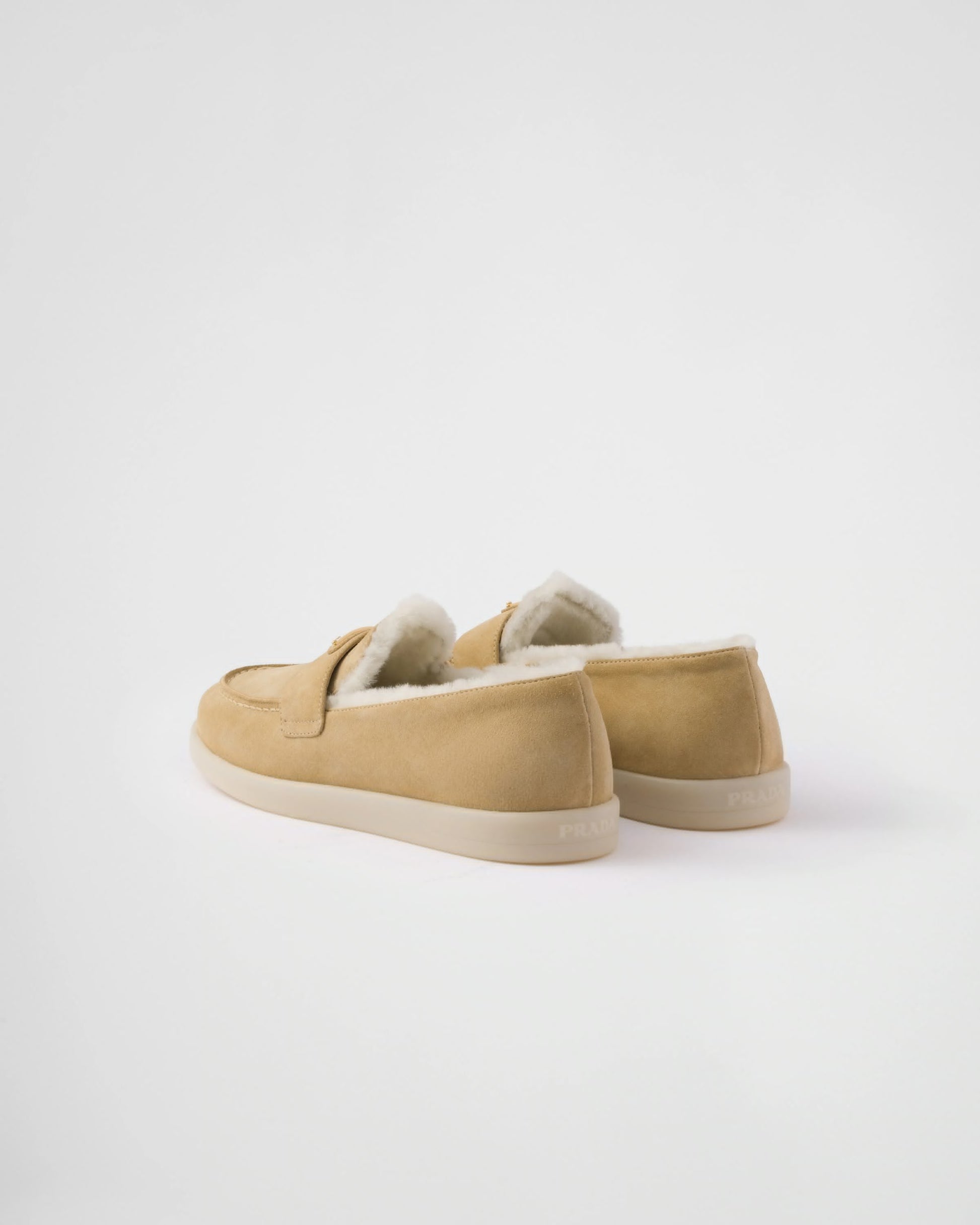 Suede and shearling loafers