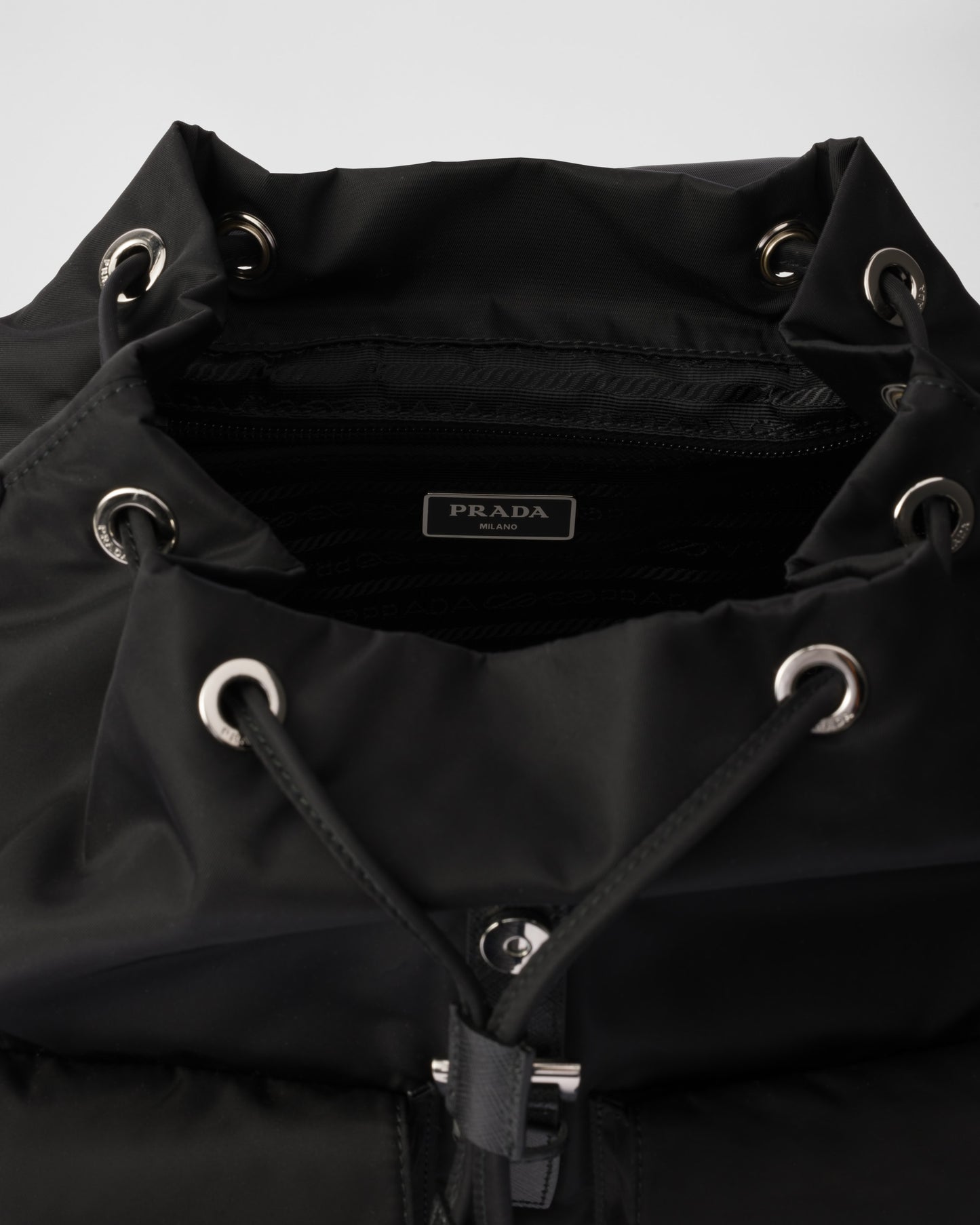 Medium Re-Nylon backpack with pouch