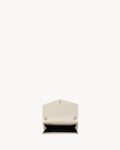 UPTOWN CHAIN WALLET IN GRAIN DE POUDRE EMBOSSED LEATHER