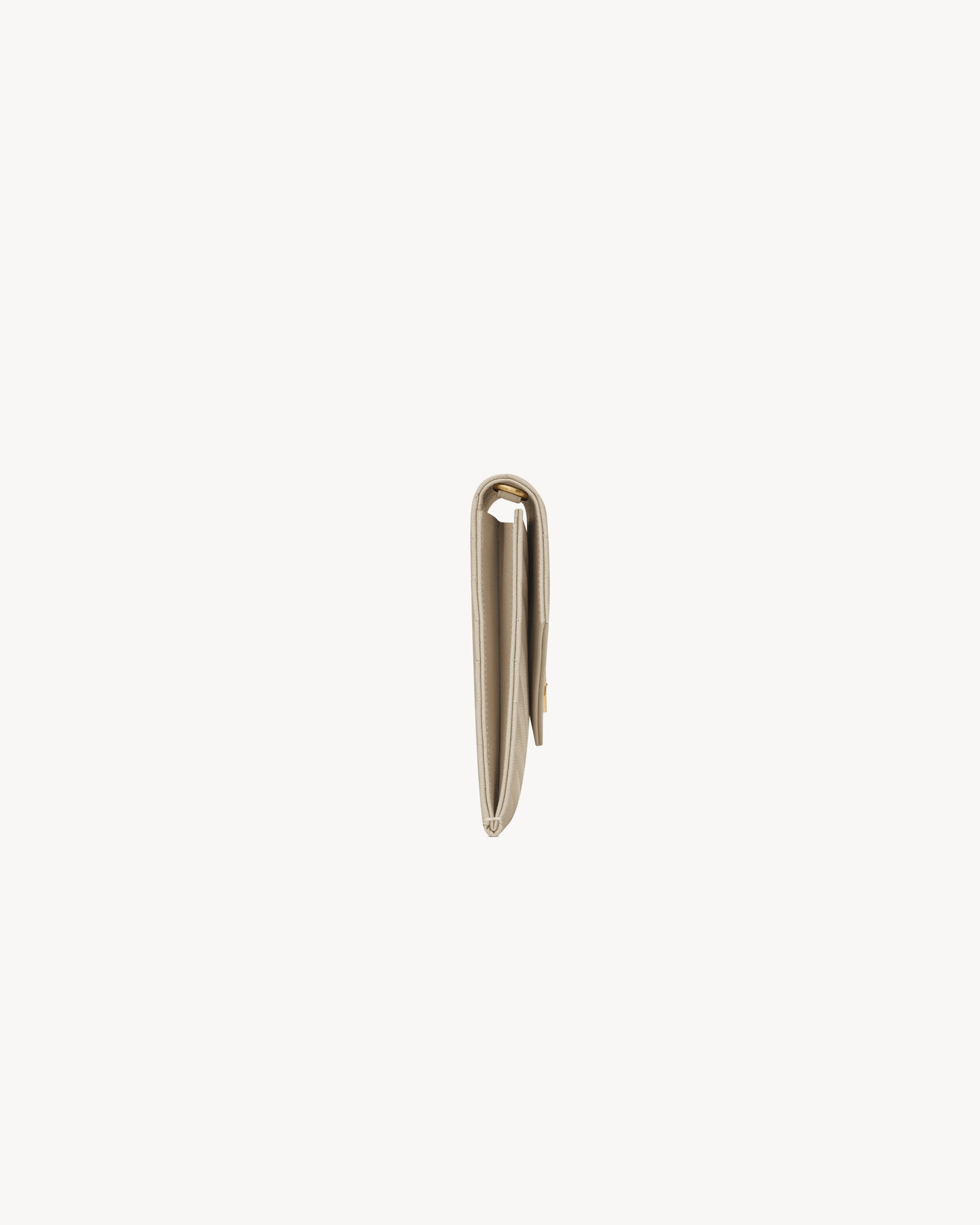 CASSANDRE MATELASSÉ FLAP POUCH in grain de poudre leather