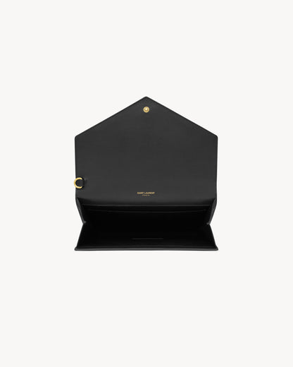 CASSANDRE flap pouch in crocodile-embossed shiny leather