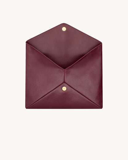 CASSANDRE large envelope pouch in shiny leather