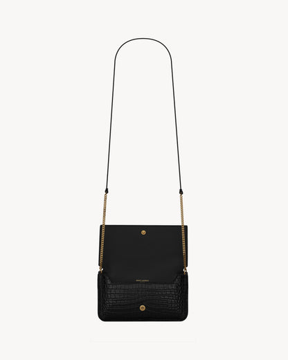 CASSANDRE phone holder in SHINY crocodile-embossed leather