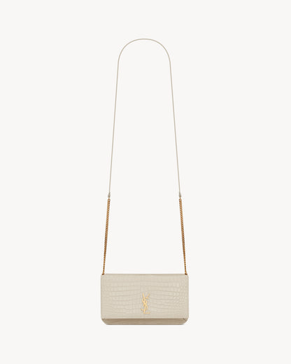 CASSANDRE phone holder in SHINY crocodile-embossed leather