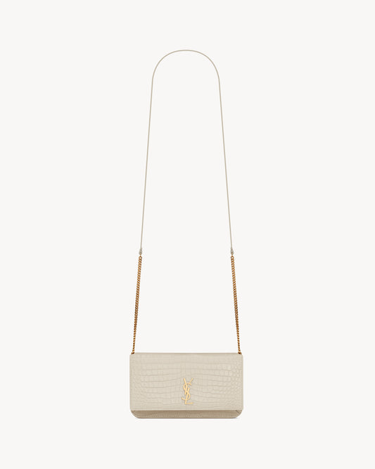 CASSANDRE phone holder in SHINY crocodile-embossed leather