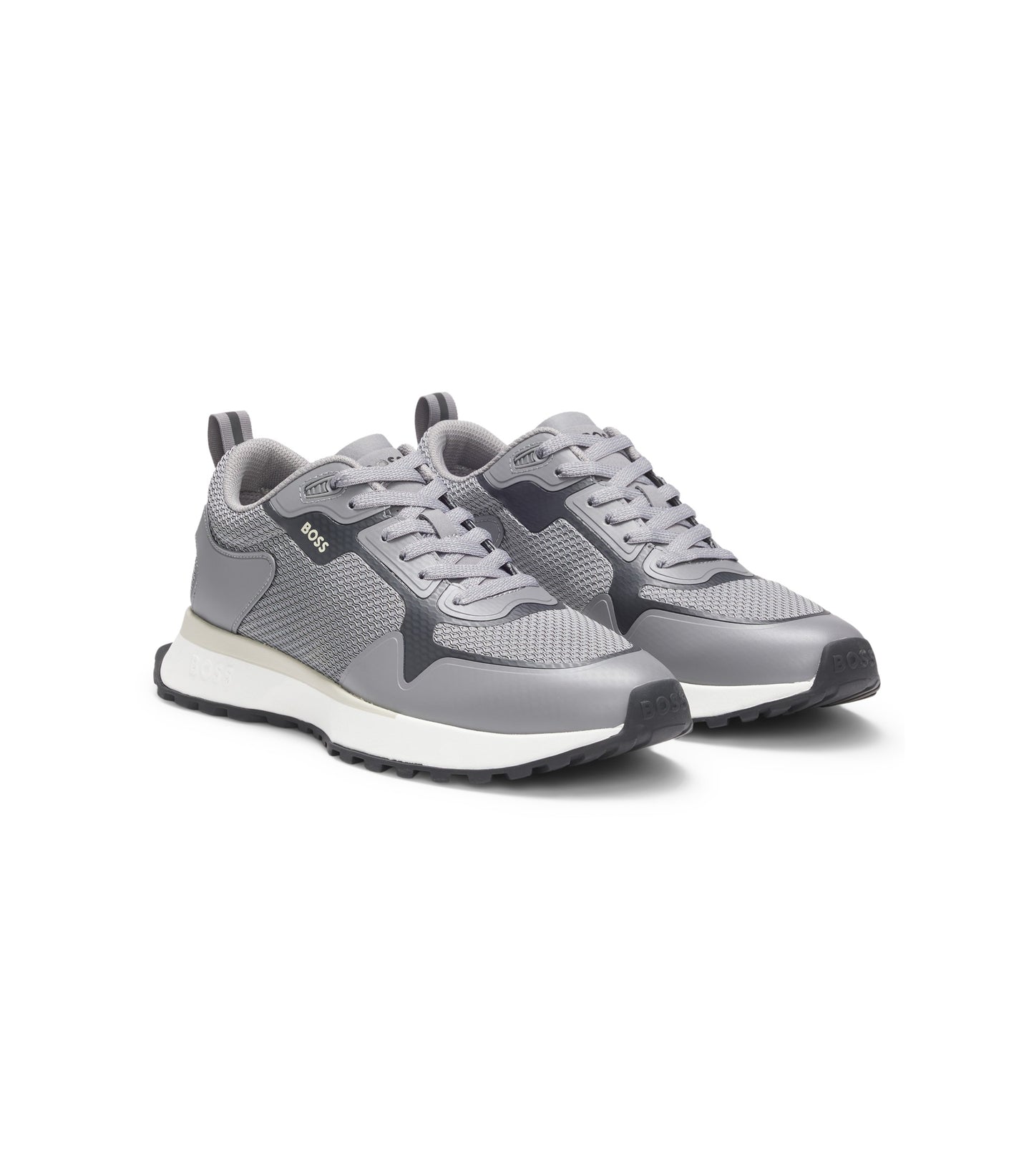 Mixed-material trainers with mesh details and branding