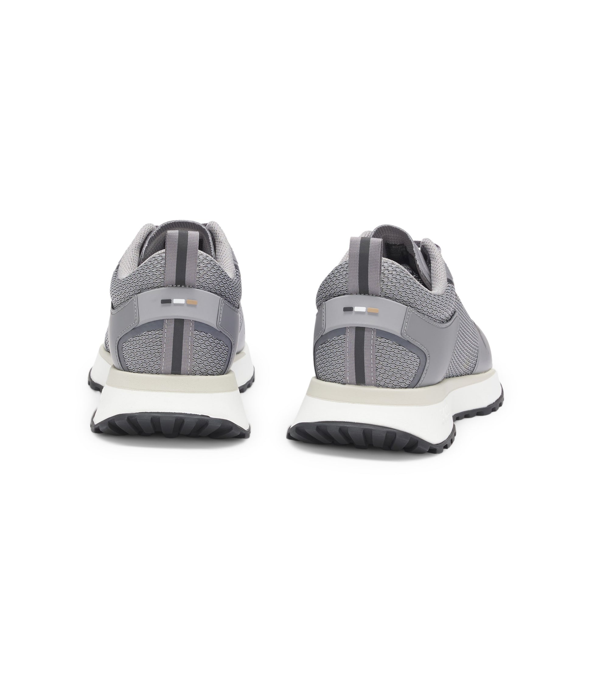 Mixed-material trainers with mesh details and branding