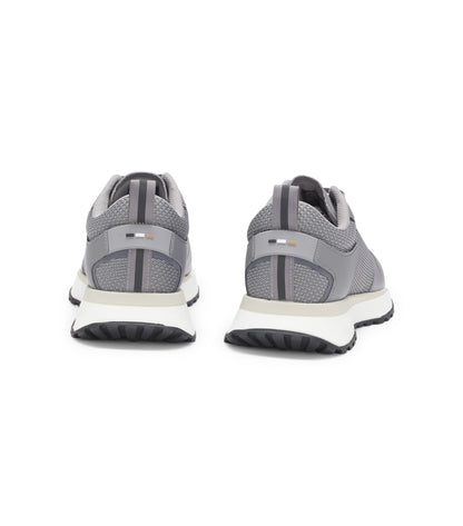 Mixed-material trainers with mesh details and branding