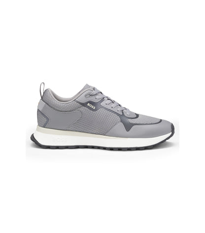 Mixed-material trainers with mesh details and branding