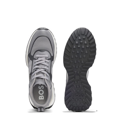 Mixed-material trainers with mesh details and branding