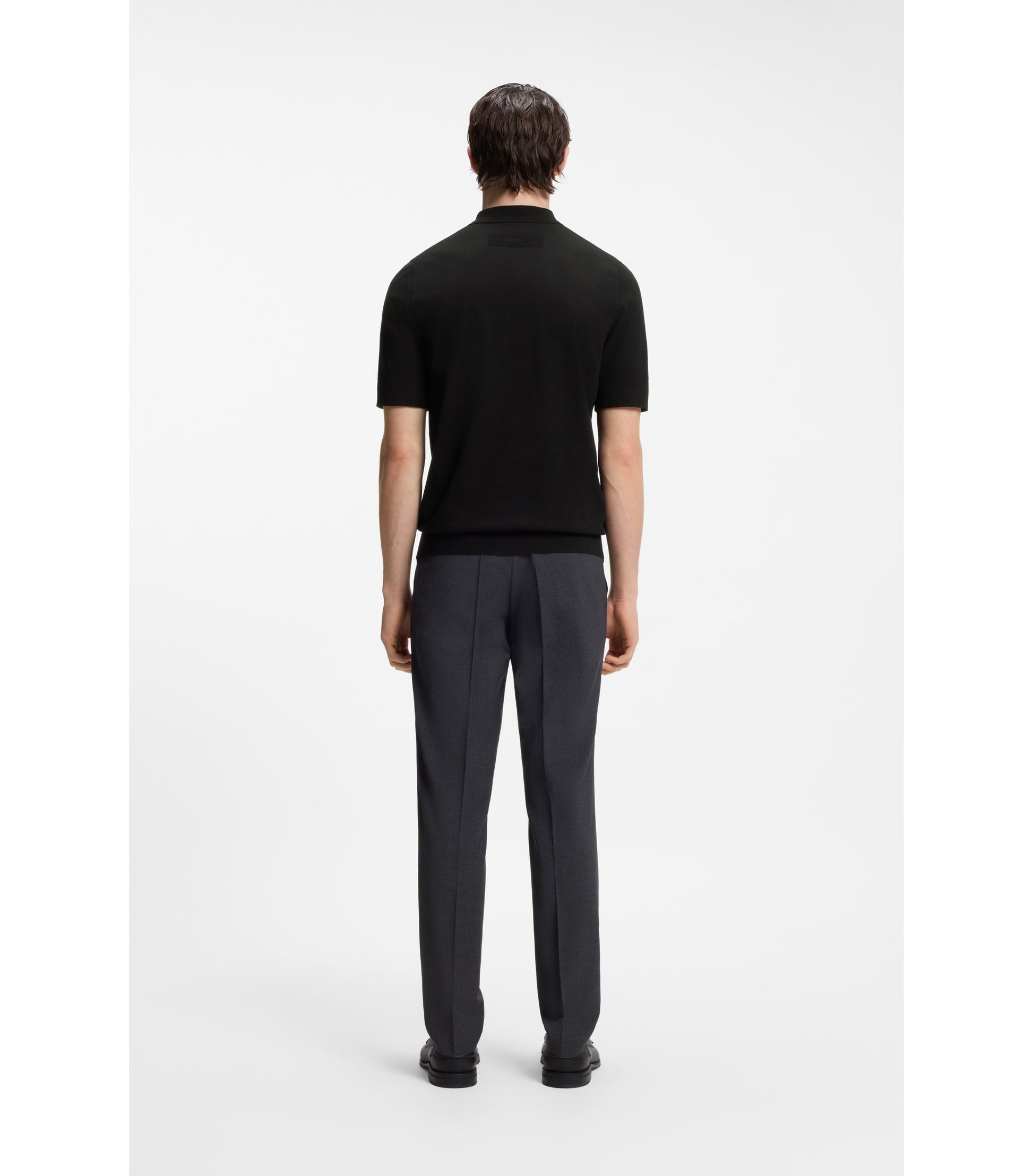 Knit polo with covered placket
