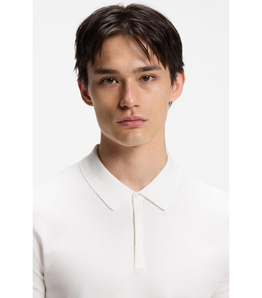 Knit polo with covered placket