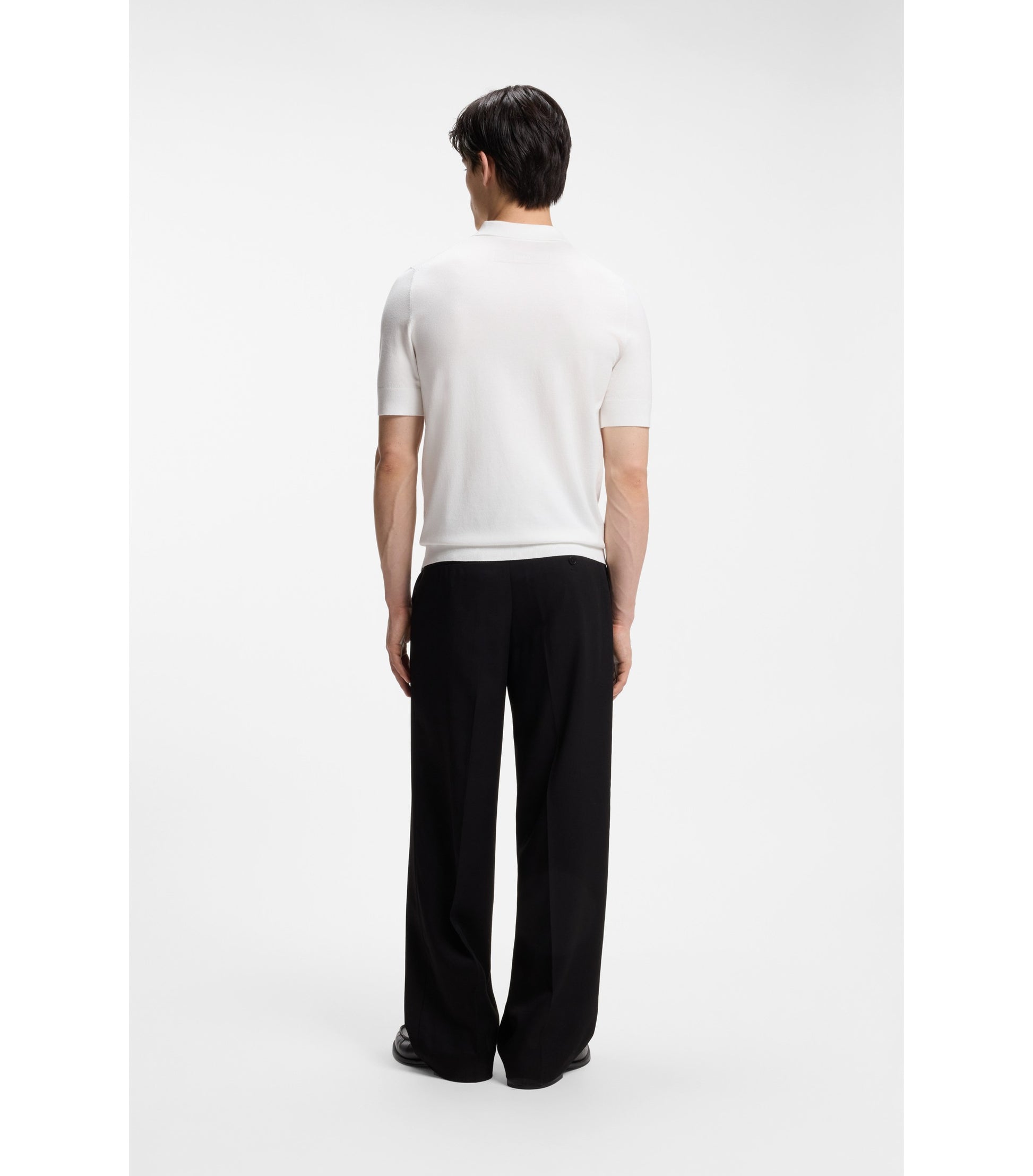 Knit polo with covered placket