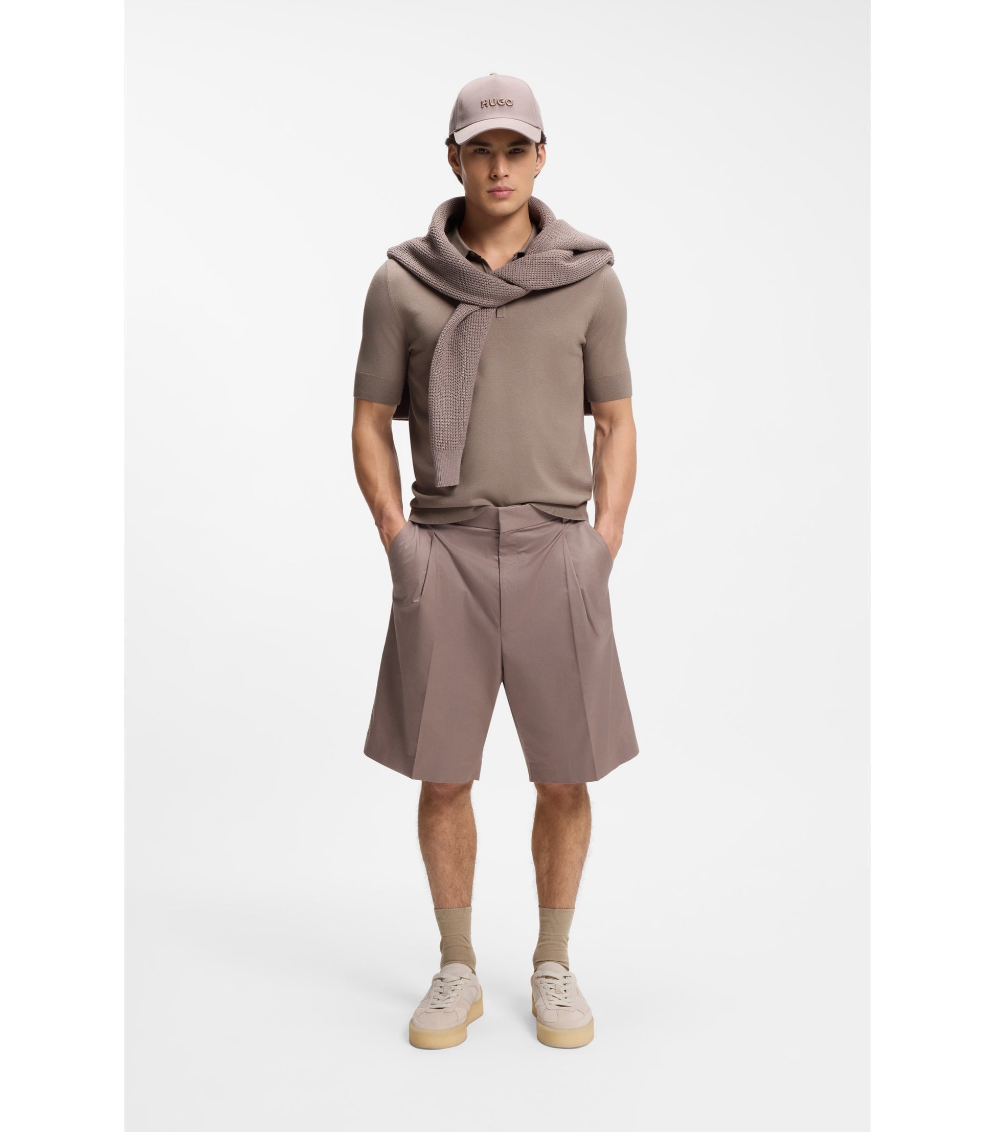 Knit polo with covered placket