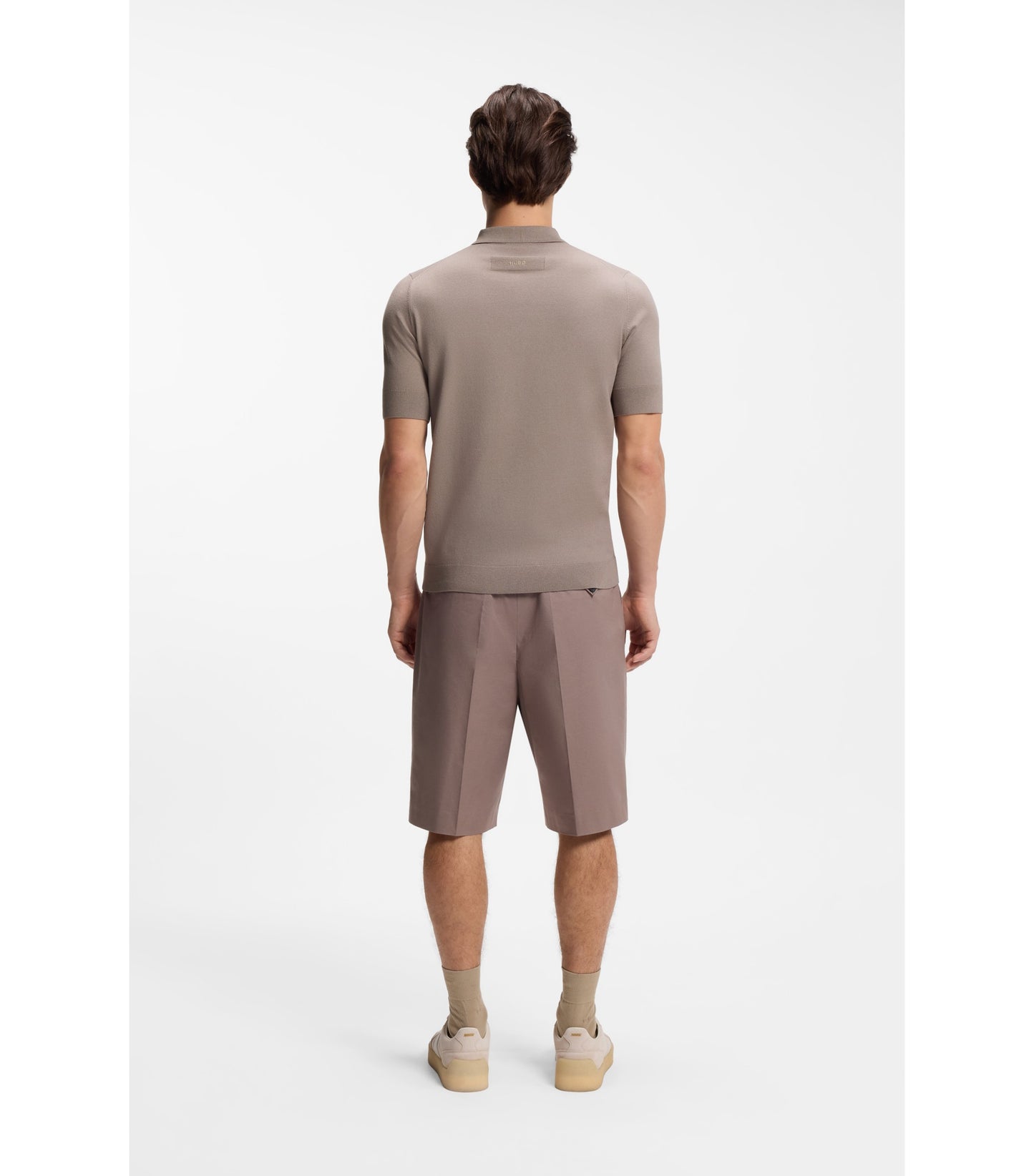 Knit polo with covered placket