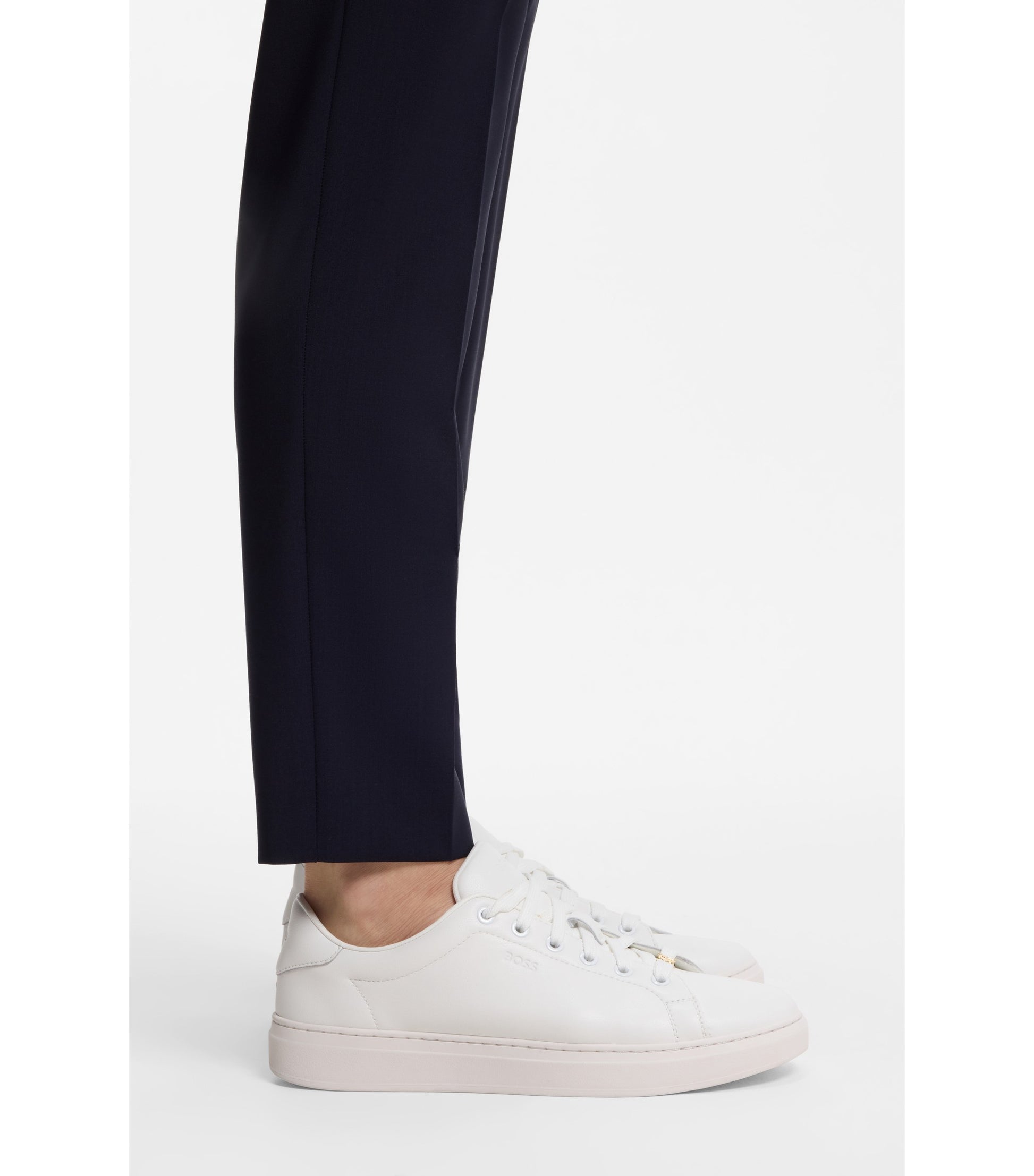 Leather trainers with embossed logos