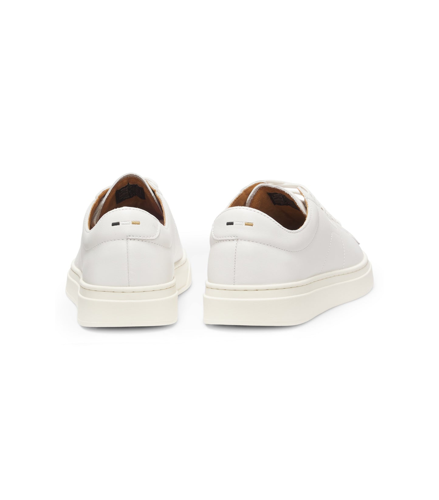 Low-top trainers in leather with embossed logo