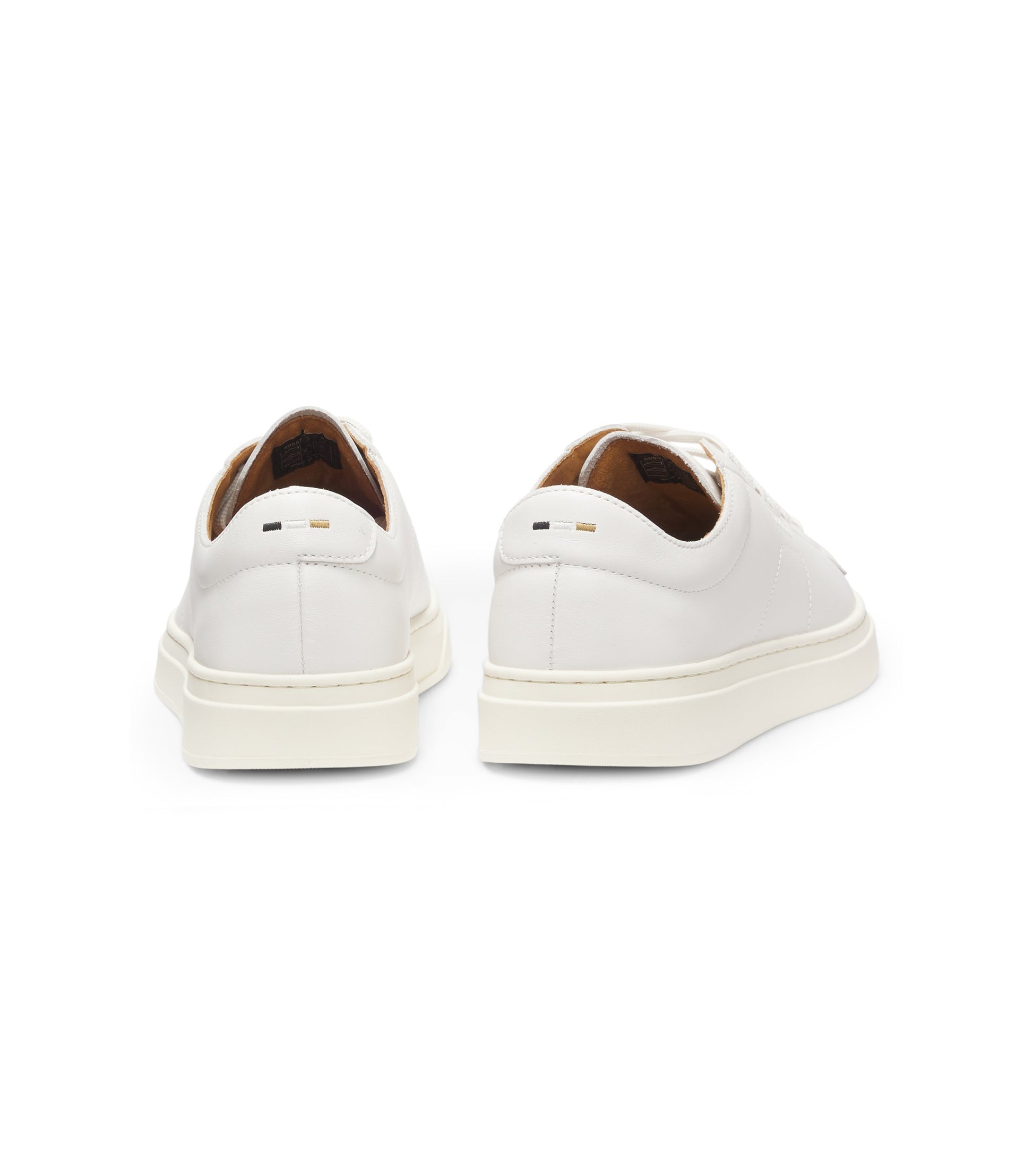 Low-top trainers in leather with embossed logo