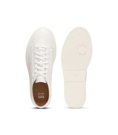 Low-top trainers in leather with embossed logo