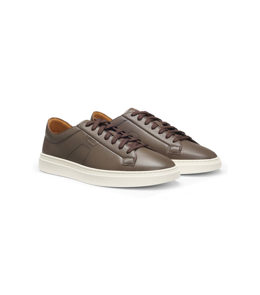 Low-top trainers in leather with embossed logo