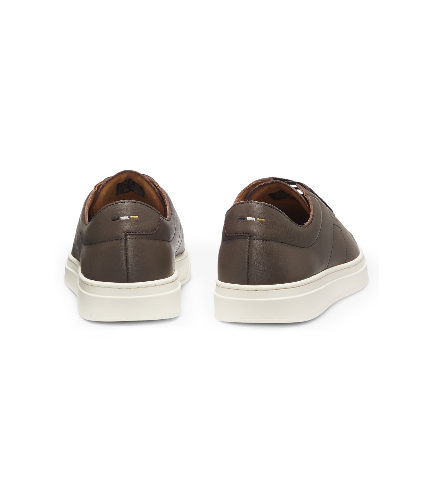 Low-top trainers in leather with embossed logo