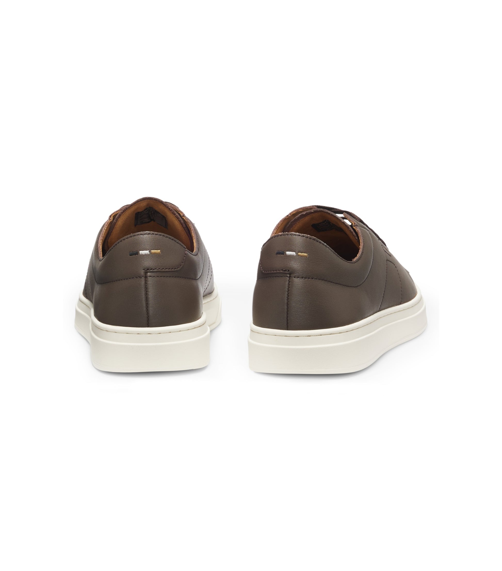 Low-top trainers in leather with embossed logo