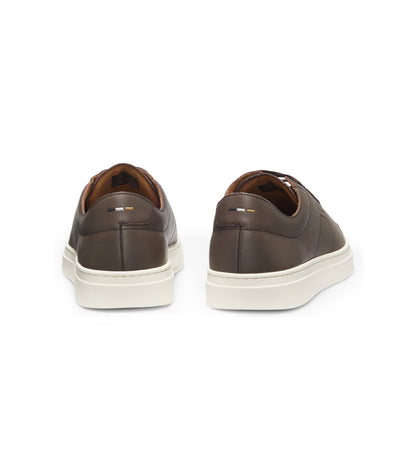 Low-top trainers in leather with embossed logo