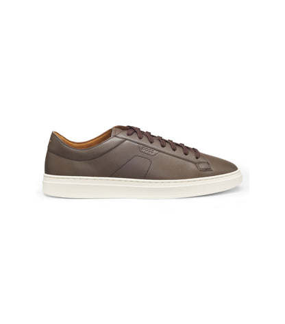 Low-top trainers in leather with embossed logo