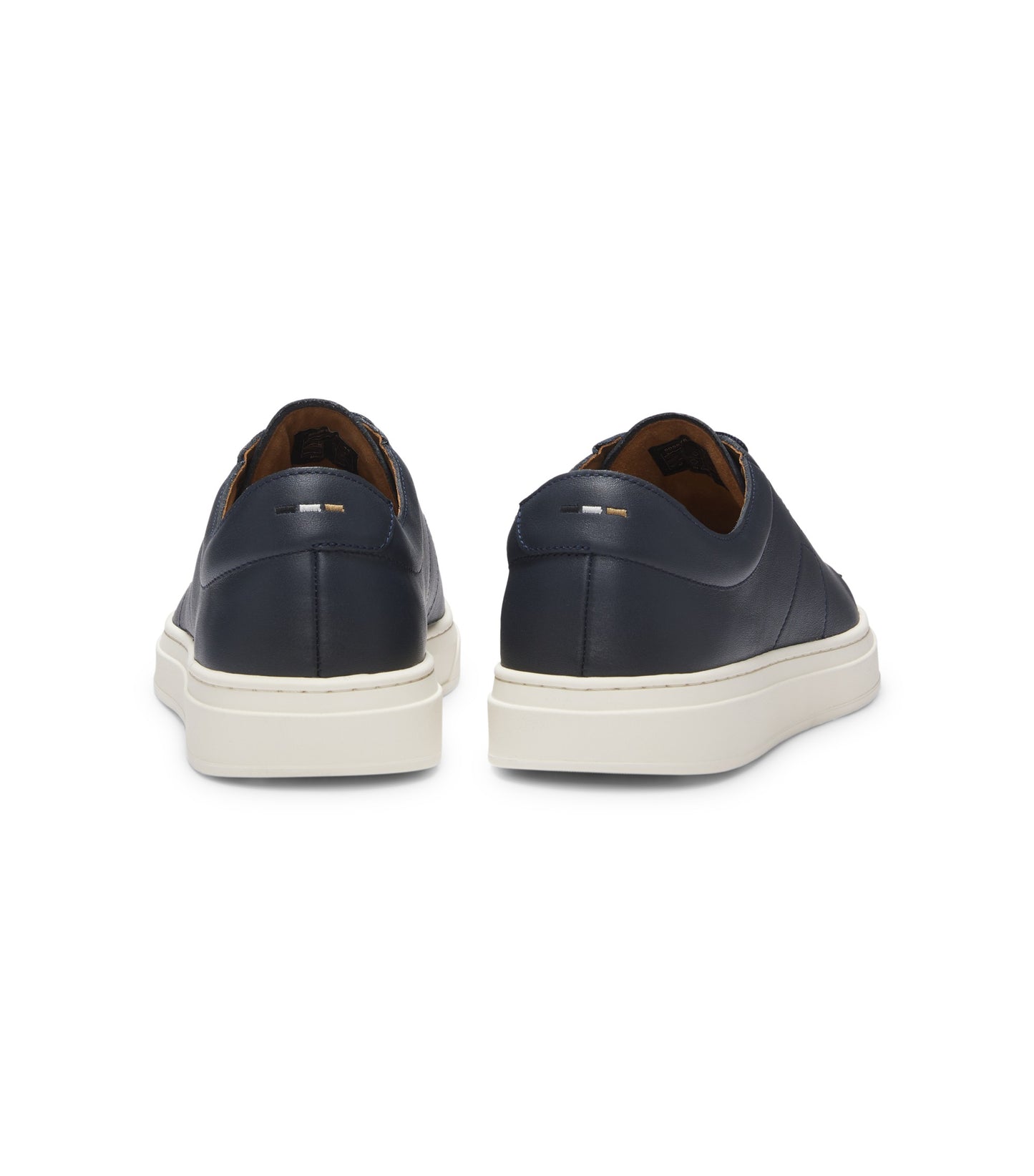 Low-top trainers in leather with embossed logo