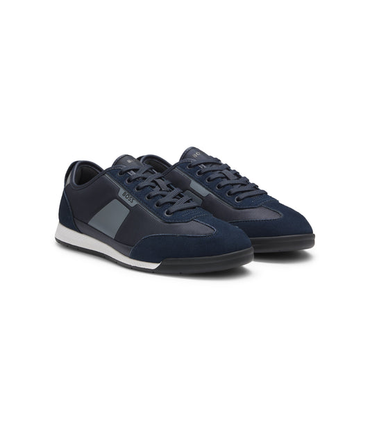 Low-top trainers with structured trims