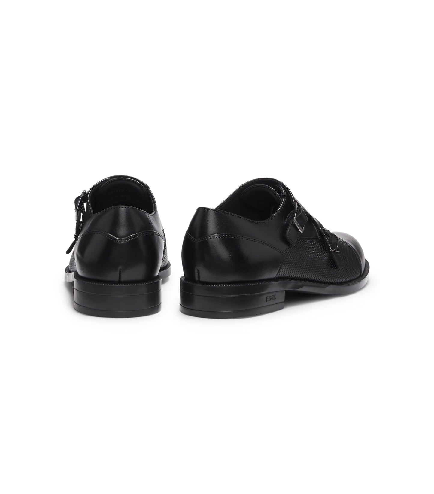 Double monk shoes in leather with perforated detail