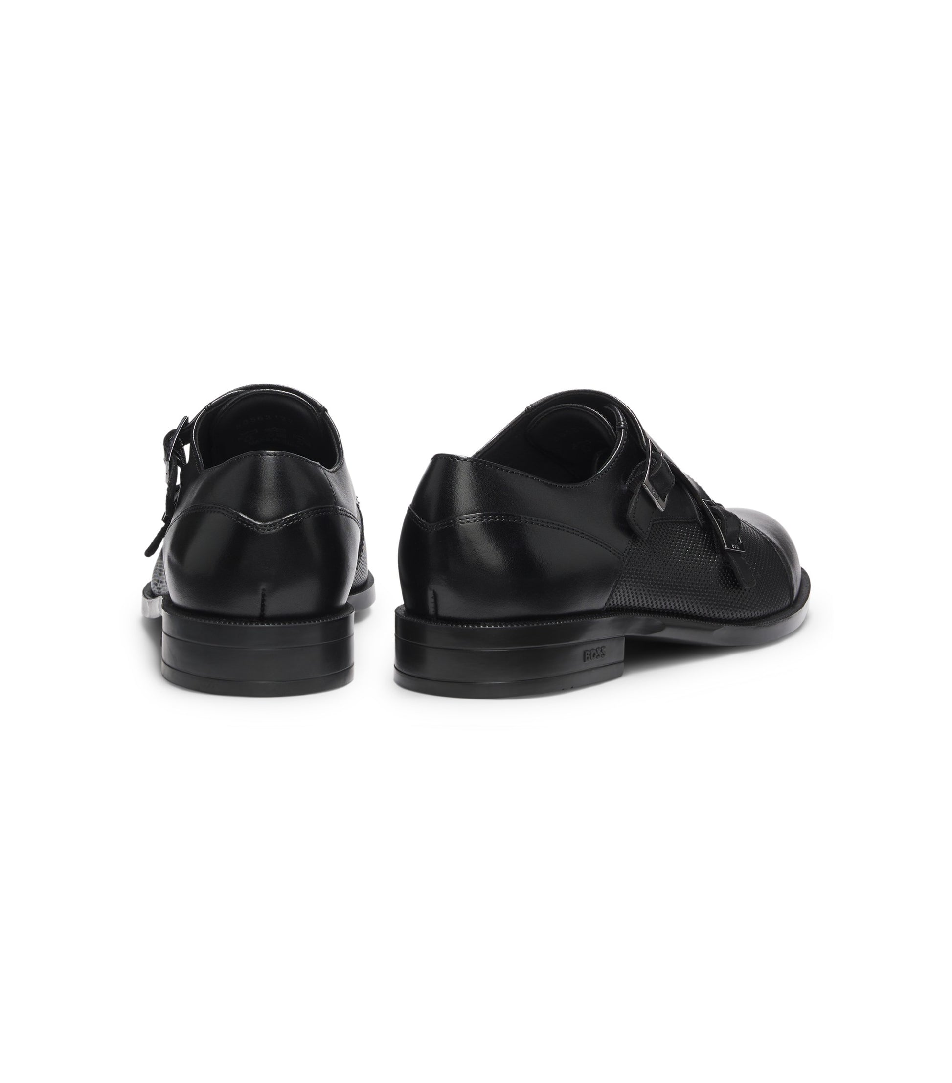 Double monk shoes in leather with perforated detail