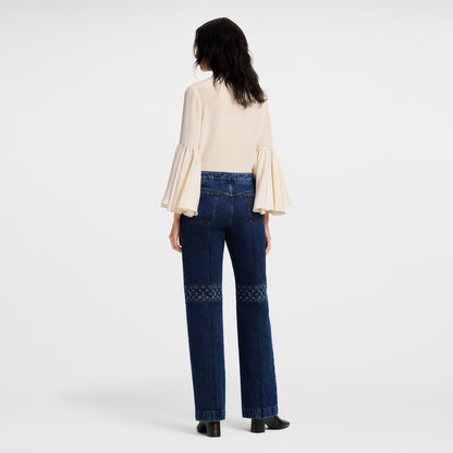 Monogram Accent Raw Denim Jeans